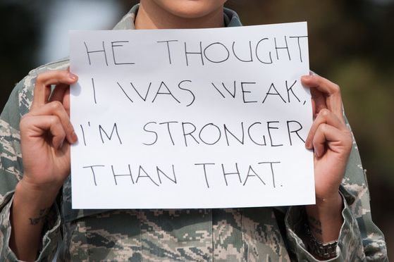 sign that says "He thought I was weak I'm stronger that that"