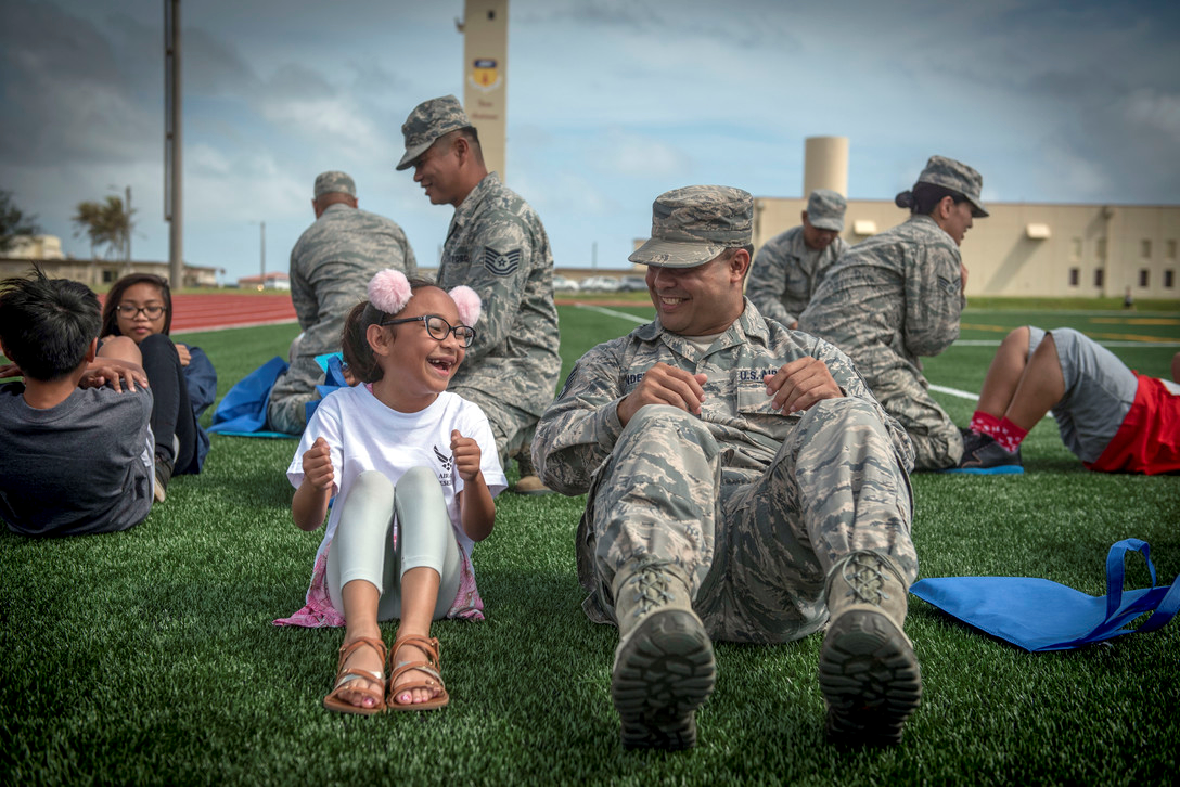 airman with his child