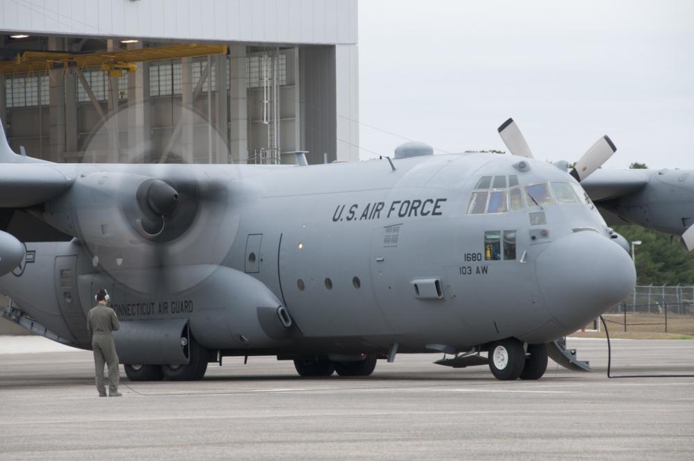 C130 coming out of a hanger