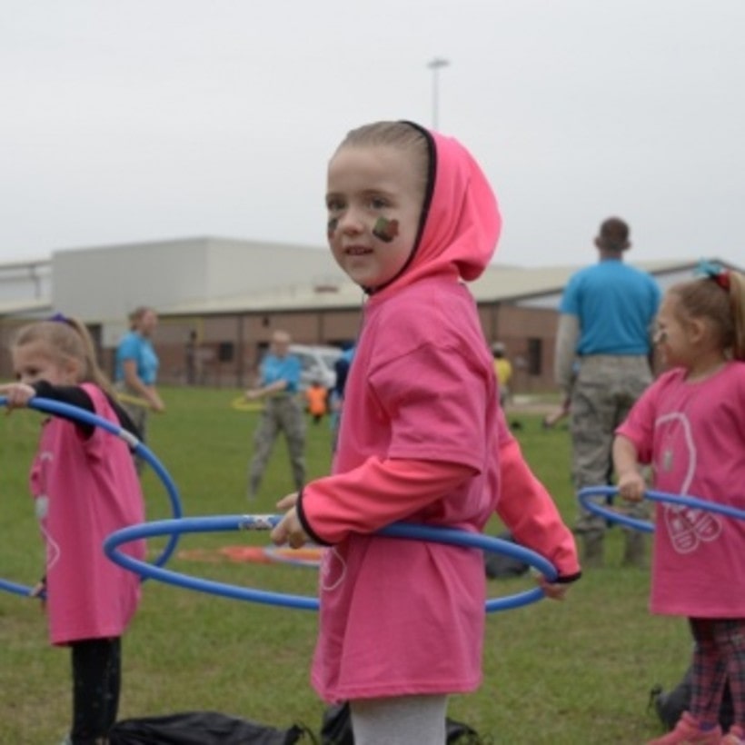 young girl hula hooping