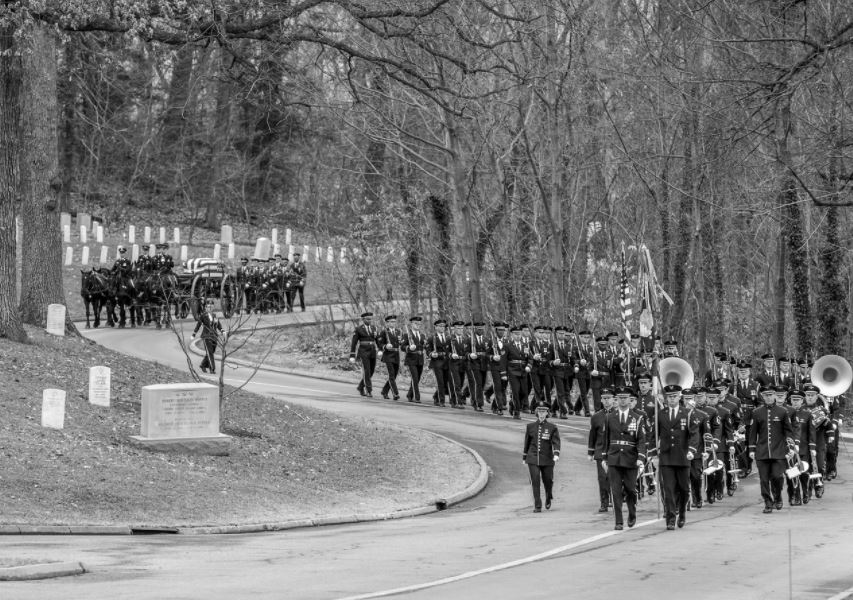 Funeral precesion through Arlington Cemetery