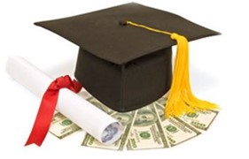 graduation cap on top of a pile of money