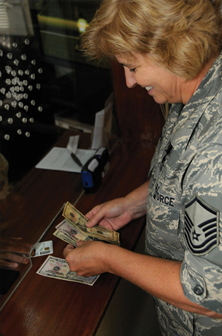 Airman counting cash