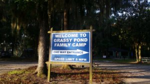 Welcome to grassy pond/ fam camp sign