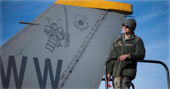 Airman inspecting an aircraft