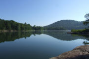 lake with mountains in the background