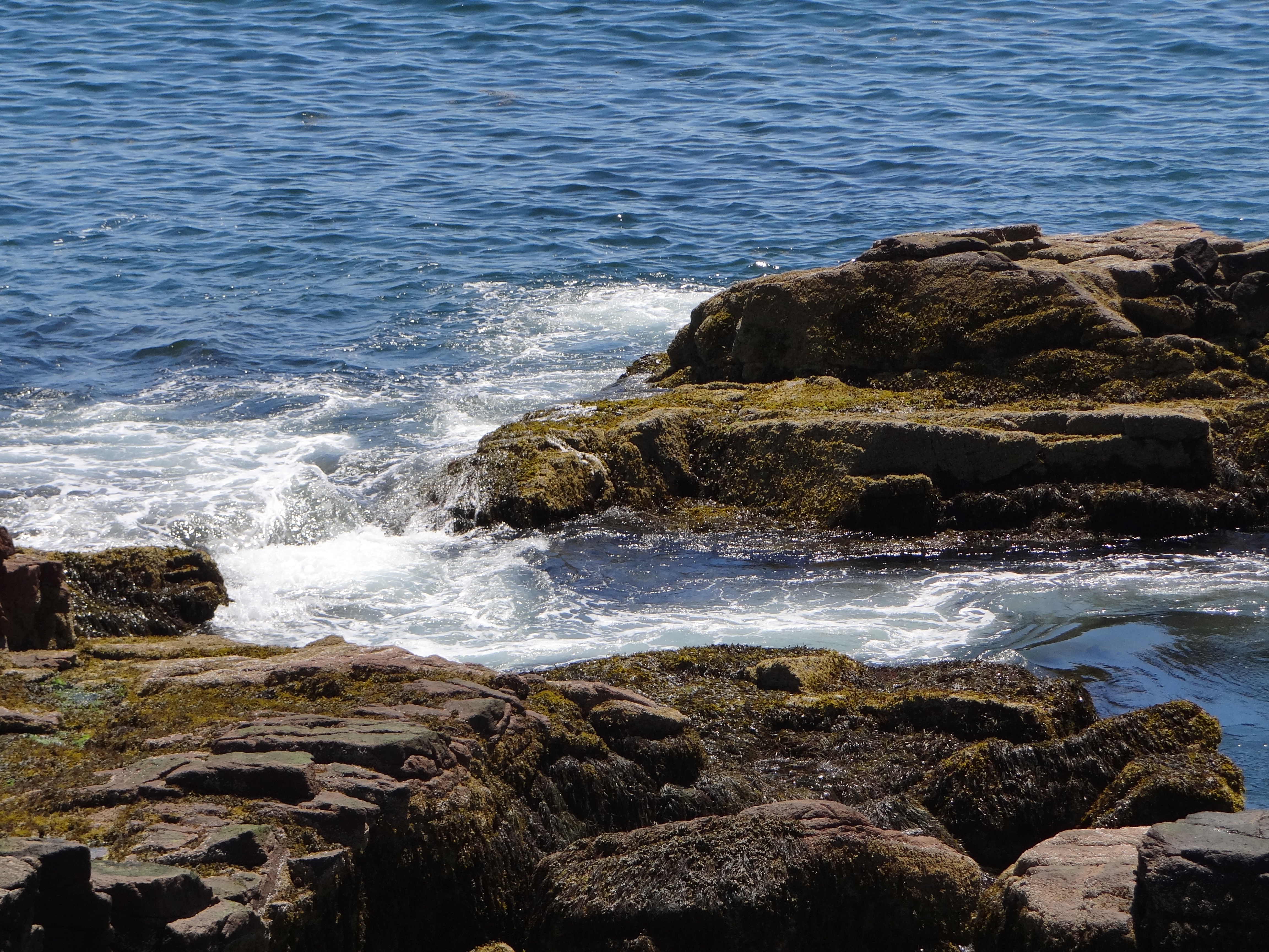 rocky coast with waves splashing