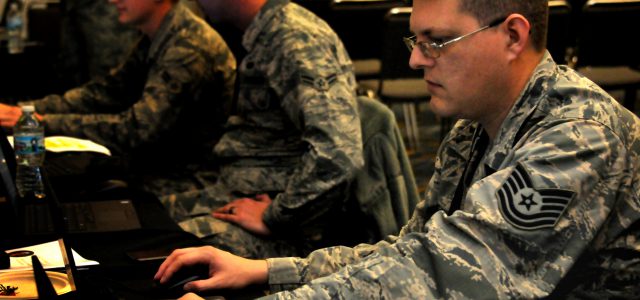 airman sitting at a desk